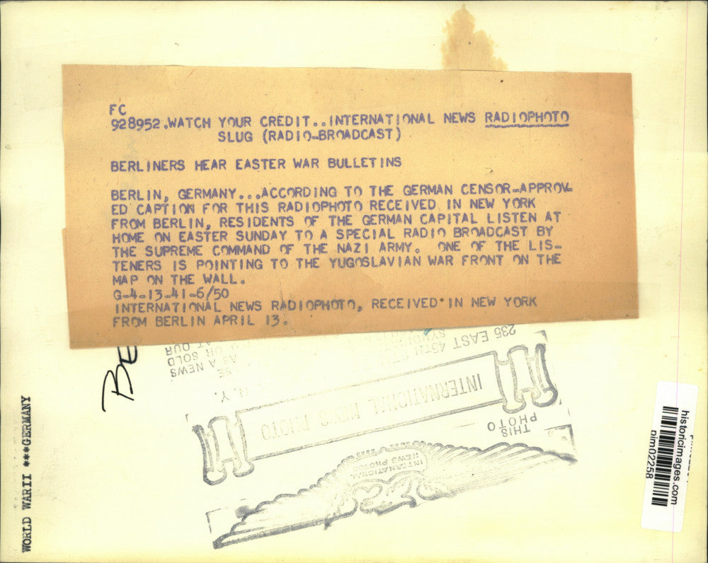 1941 Press Photo German residents listen to radio broadcast, Yugoslavian war map