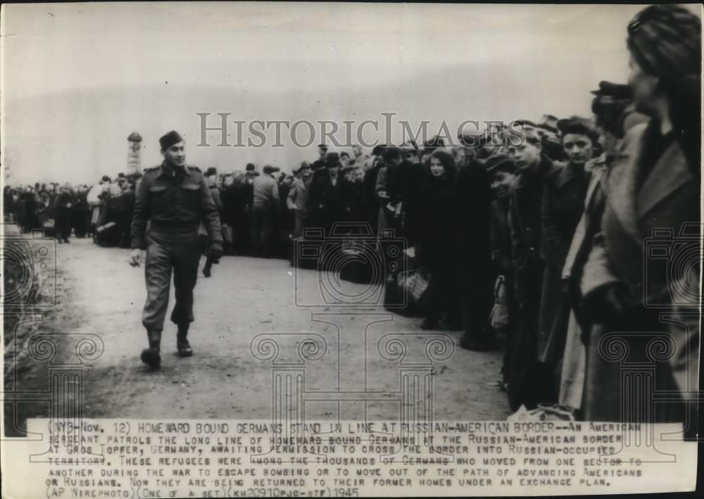 1945 Press Photo US Sergeant inspects German refugees at the Russian-US border- Historic Images