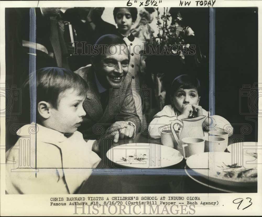 1970 Press Photo Chris Barnard visits a children's school at Induno Olona.- Historic Images