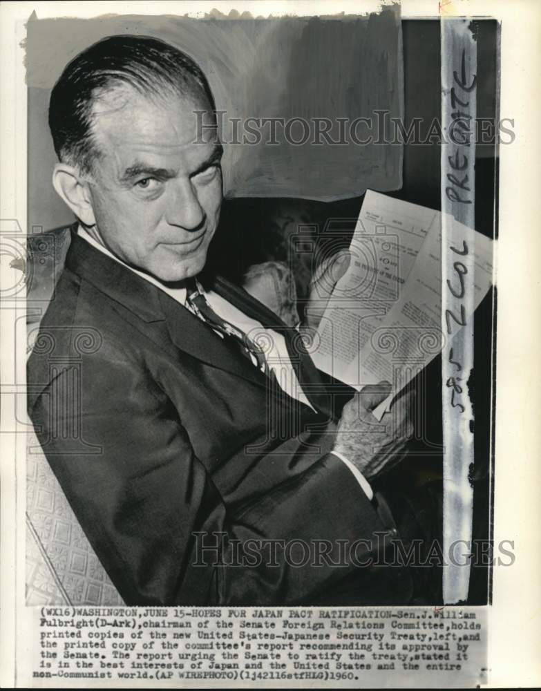 1960 Press Photo Senator J. William Fulbright holds copy of treaty in Washington- Historic Images