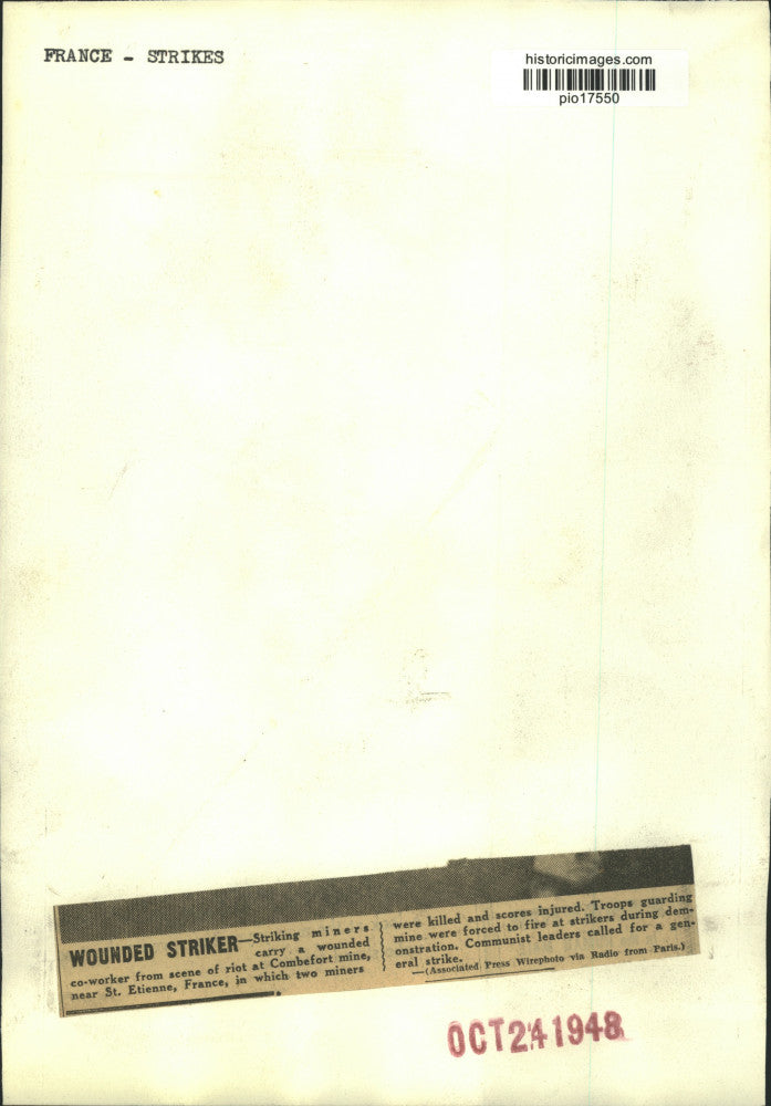 1948 Press Photo Striking miners carry wounded coworker at St. Etienne, France