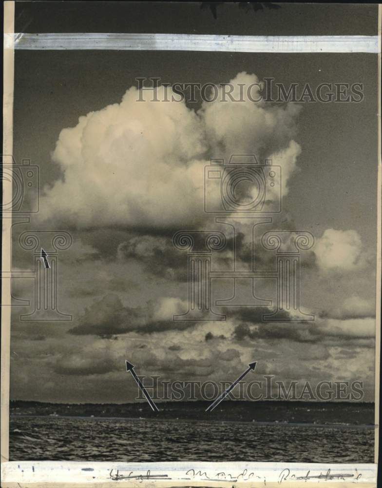 Load image into Gallery viewer, Press Photo Clouds over land and sea - pio25171
