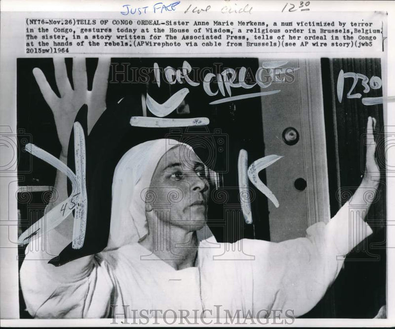 Load image into Gallery viewer, 1964 Press Photo Sister Anne Marie Merkens speaks during civil war in The Congo
