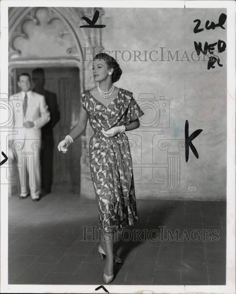 Load image into Gallery viewer, 1952 Press Photo Woman models a "From Adele Simpson" dress - pio37165
