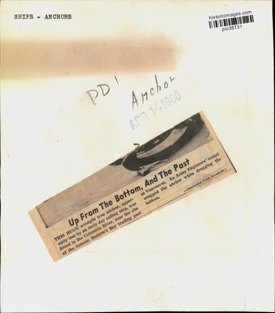 1960 Press Photo Men & wrought iron anchor by Hudson's Bay trading post, Canada