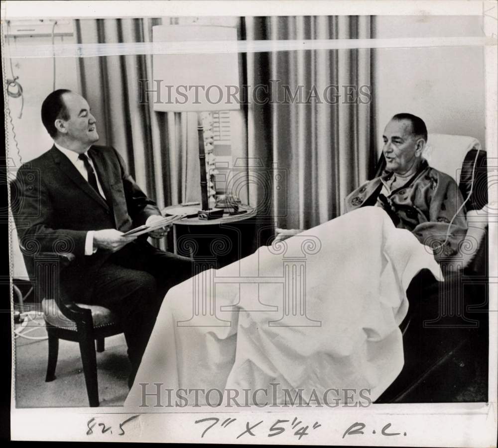 1965 Press Photo President Johnson talks with Hubert Humphrey at hospital in MD