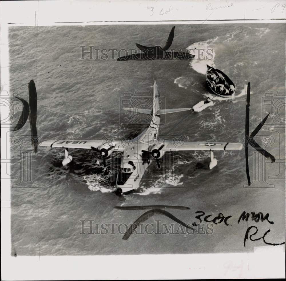 1953 Press Photo Group Albatross rescues Korean seaman in Okinawa's Buckner Bay