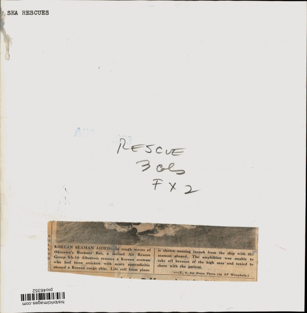 1953 Press Photo Group Albatross rescues Korean seaman in Okinawa's Buckner Bay