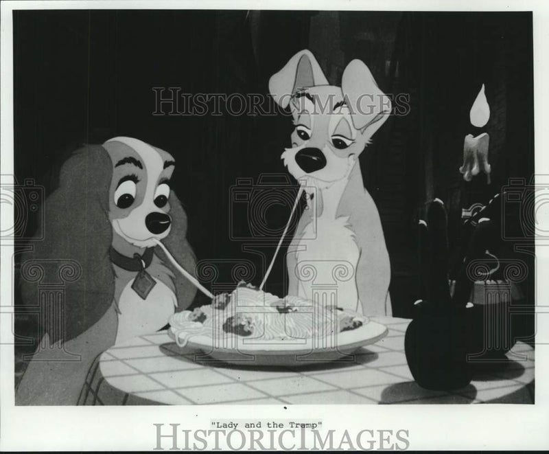 Load image into Gallery viewer, 1987 Press Photo Main Cartoon Characters in "Lady &amp; The Tramp" eating spaghetti
