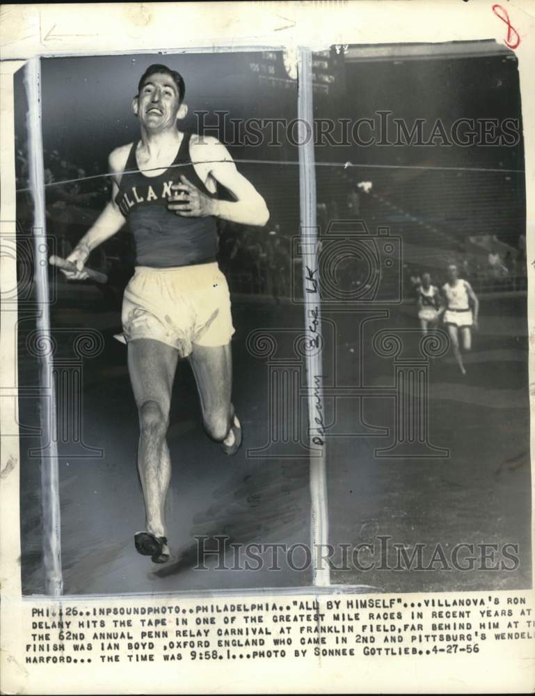 1956 Press Photo Villanova track runner Ron Delany wins the Penn Relays mile- Historic Images