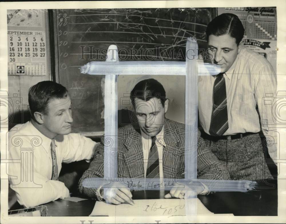 1941 Press Photo Football Coaches map strategy in conference, Los Angeles, CA- Historic Images