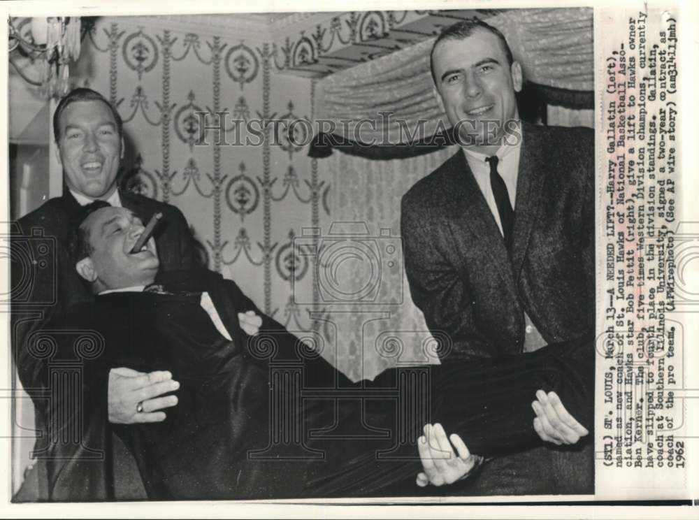 1962 Press Photo St. Louis Hawks&#39; owner lifted by player &amp; new coach, St. Louis- Historic Images
