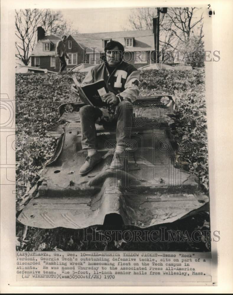 1970 Press Photo Football player Renso "Rock" Perdoni sits on float, Atlanta, GA- Historic Images