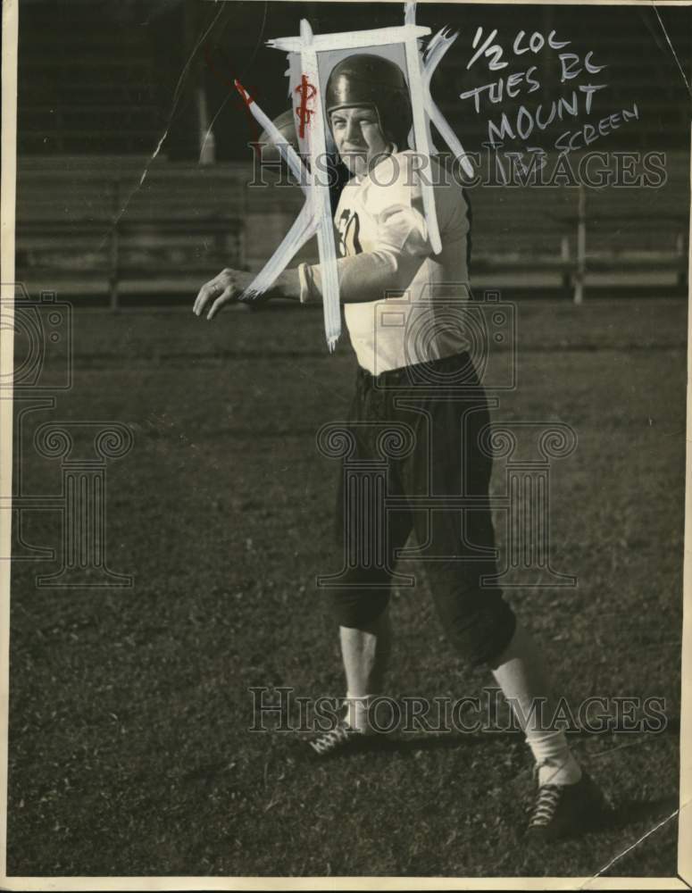 1944 Press Photo Football player Dean MacAdams in throwing stance - pis03028- Historic Images