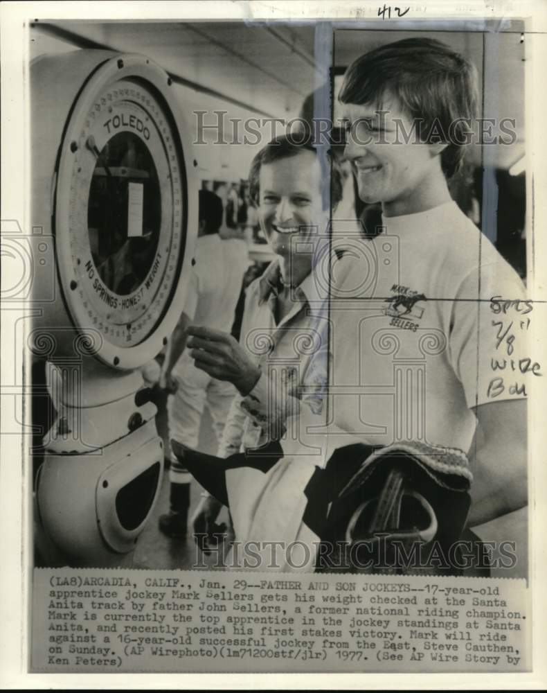 1977 Press Photo Jockey John Sellers & son Mark, Santa Anita Track, Arcadia, CA- Historic Images