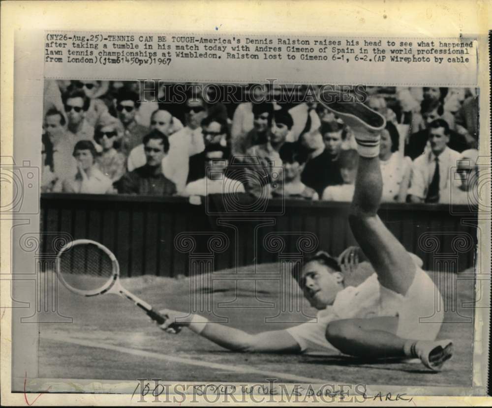 1967 Press Photo Tennis player Dennis Ralston falls in Wimbledon Tennis match- Historic Images