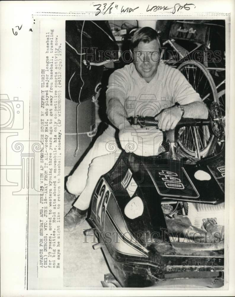 1974 Press Photo Former Major League Baseball player Woody Held & snowmobile, WY- Historic Images