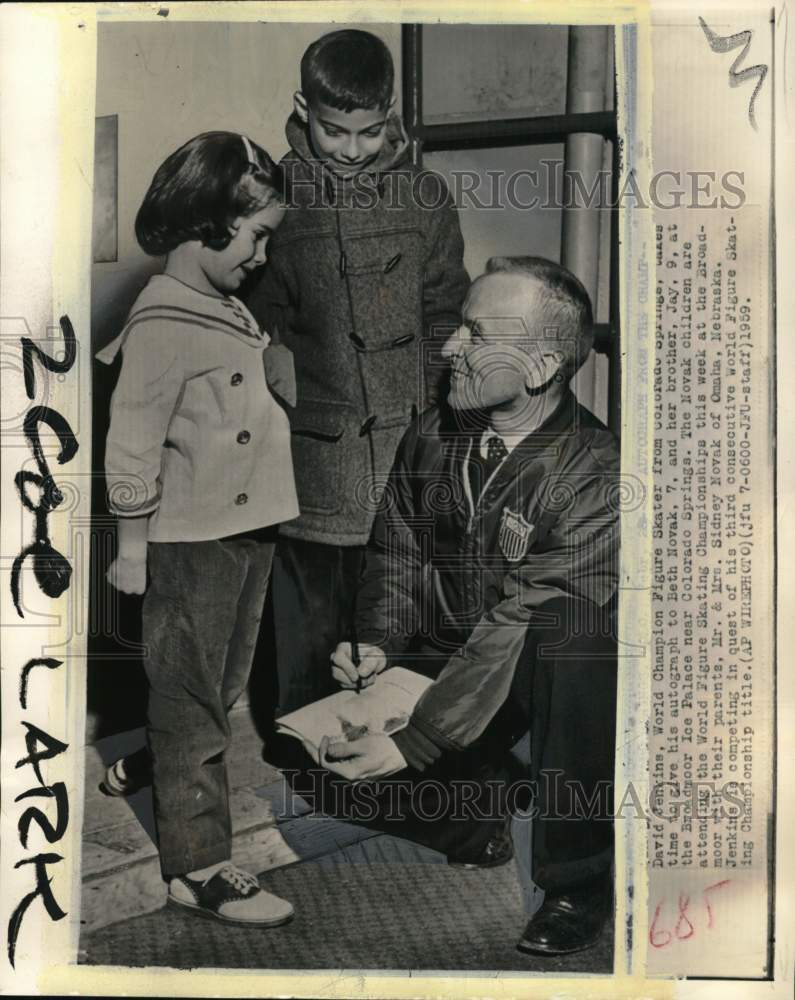 1959 Press Photo Figure skater David Jenkins gives autograph to children, CO- Historic Images