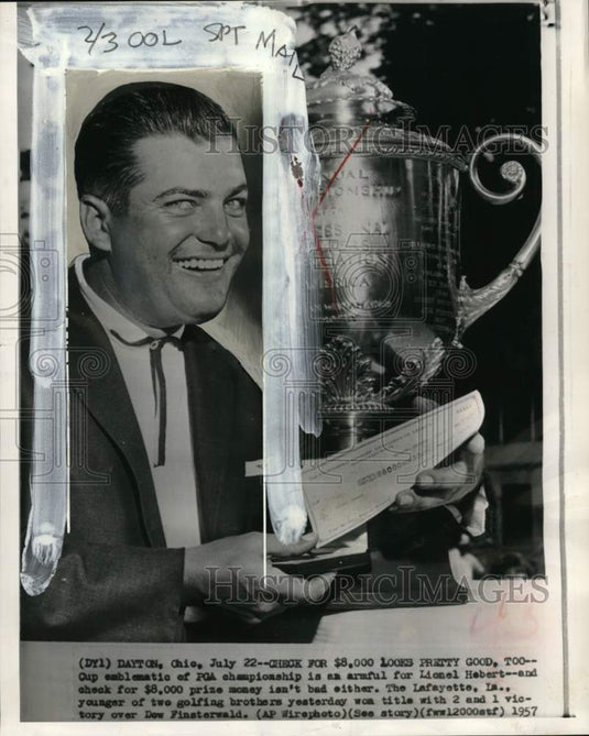 1957 Press Photo Golfer Lionel Hebert with cup & check, Dayton, Ohio - pis06507- Historic Images