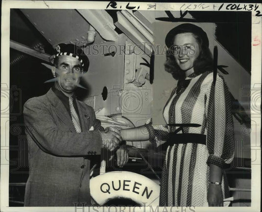 1950 Press Photo Swimmer Shirley Mae France & man shake hands - pis07274- Historic Images