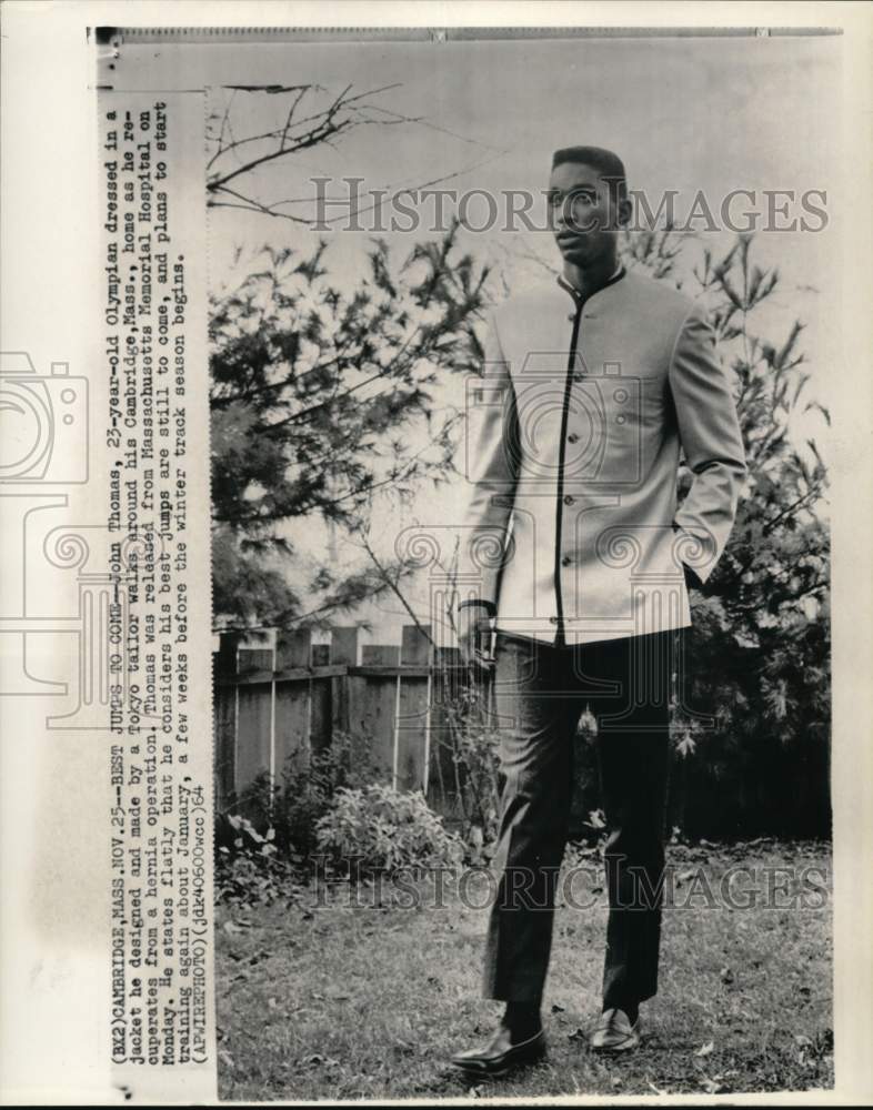 1964 Press Photo Hurdler John Thomas recuperates at his Cambridge home, MA- Historic Images