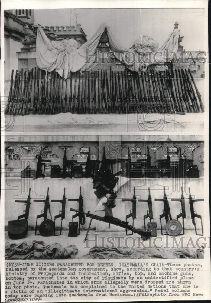Load image into Gallery viewer, 1954 Press Photo Airdropped rifles &amp; machine guns to Tiquisate rebels,Guatemala
