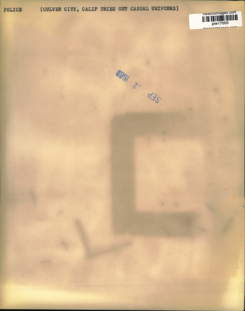 1969 Press Photo Bob Wassertheur & Norm Traub display casual uniforms in CA