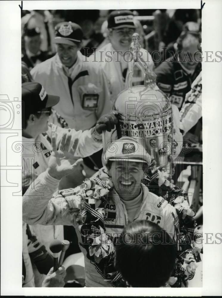 1983 Press Photo Race car driver Tom Sneva celebrates victory, Indianapolis 500- Historic Images