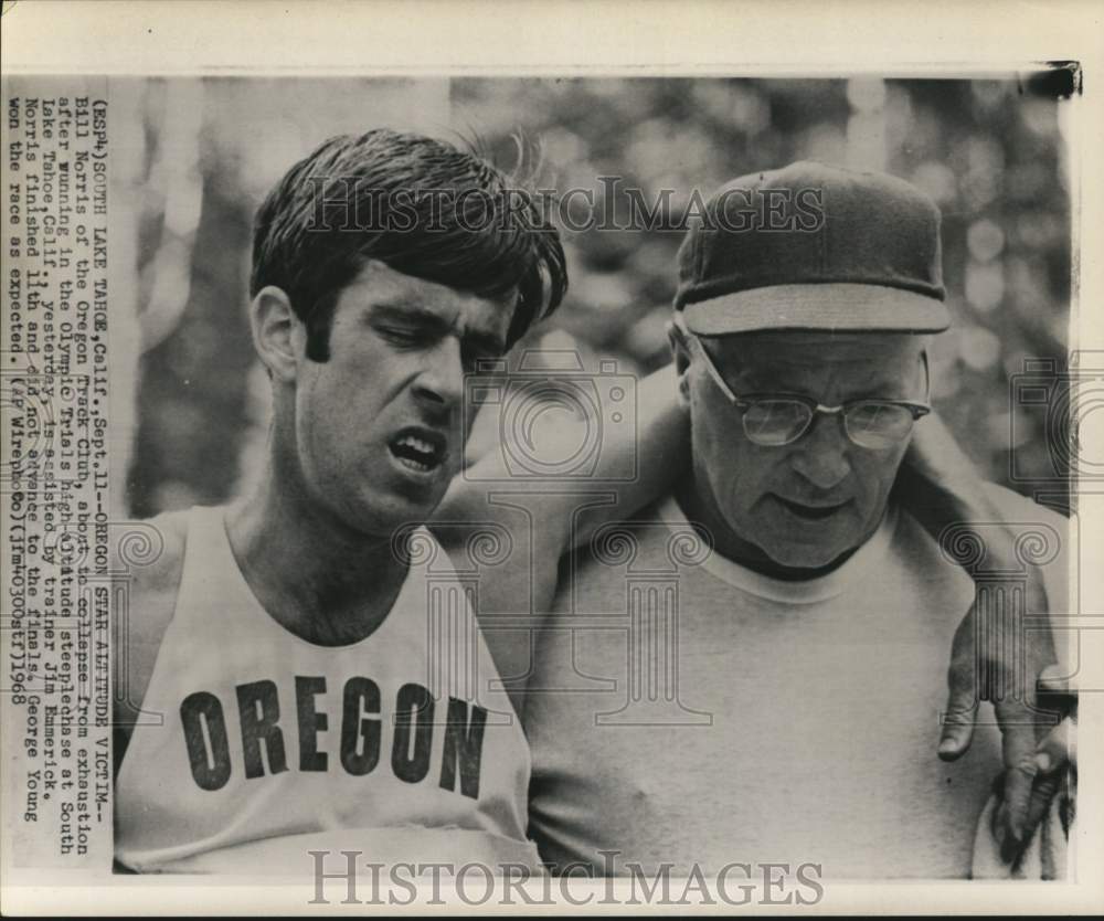 1968 Press Photo Exhausted runner Bill Norris assisted by Jim Emmerick, CA- Historic Images