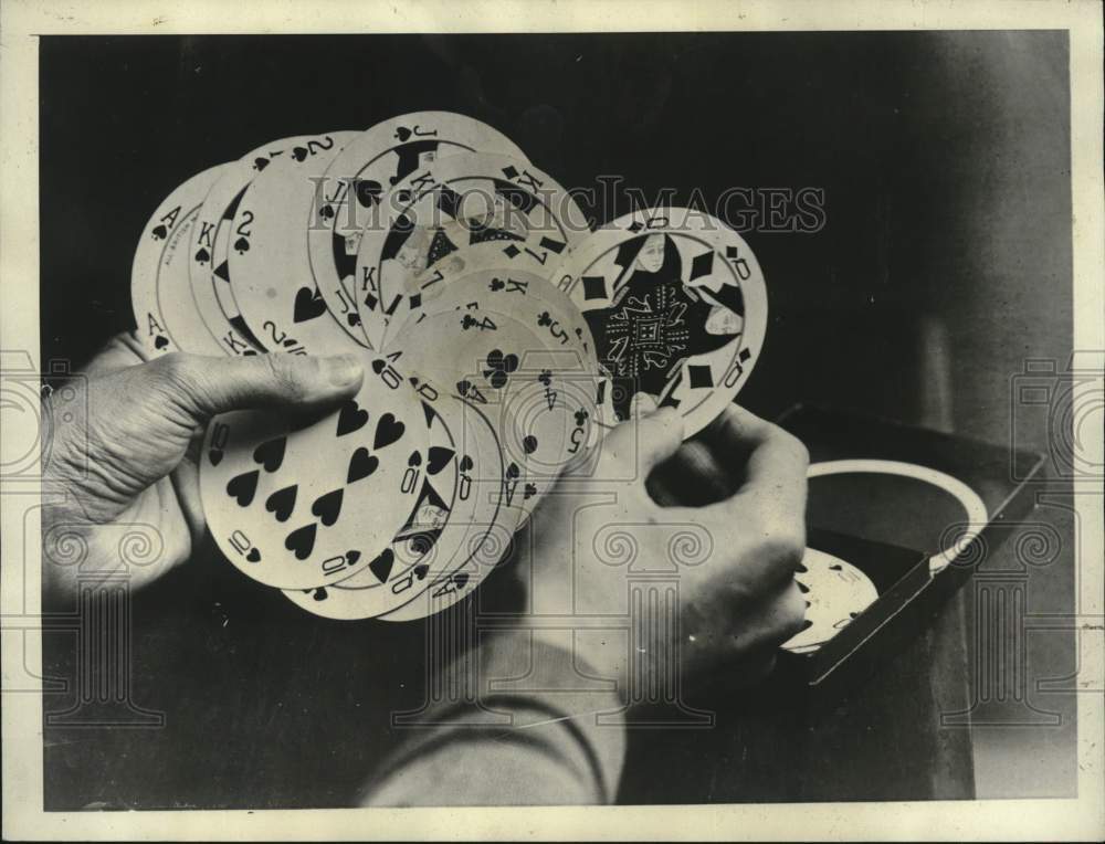 1929 Press Photo Man shows round playing cards in London, England- Historic Images
