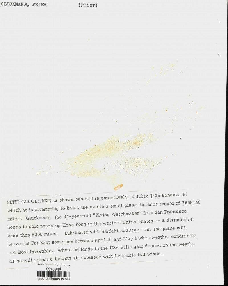 Press Photo Pilot Peter Gluckmann examines his J-35 Bonanza plane - pix39466