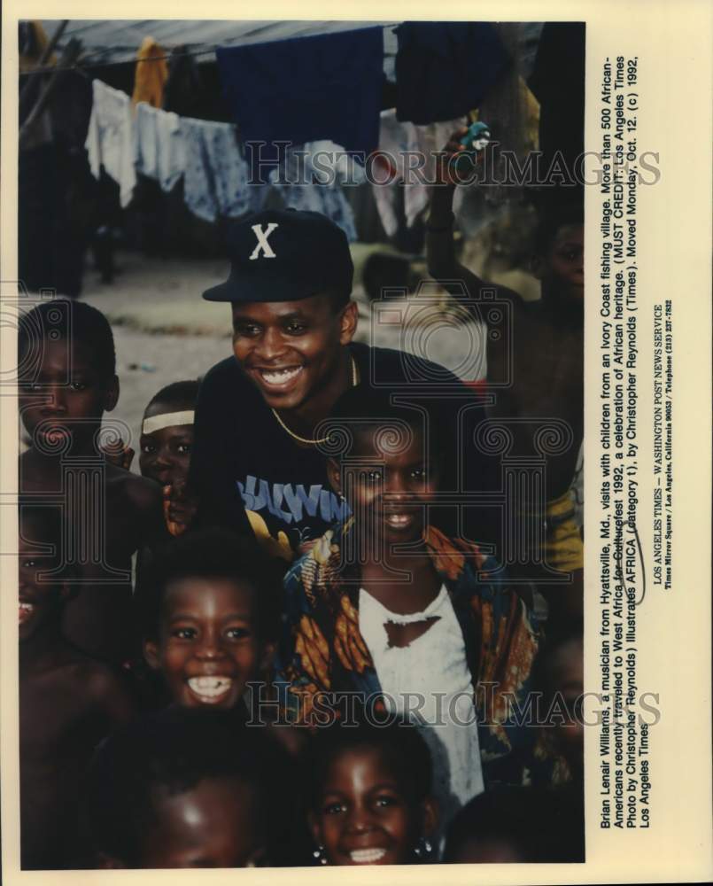 1992 Press Photo Musician Brian Lenair Williams in West Africa with Children- Historic Images