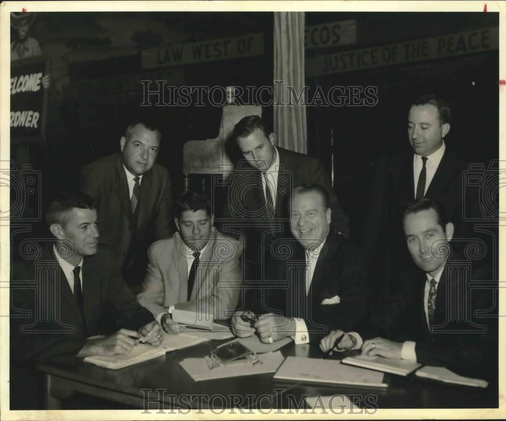 1965 Press Photo Aubrey Kline, others, reviewing Stock Show Souvenir program- Historic Images