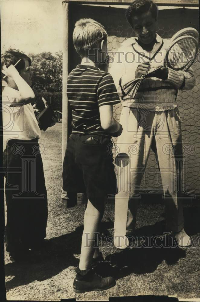 1954 Press Photo Young tennis fans getting autograph from player - saa27371- Historic Images