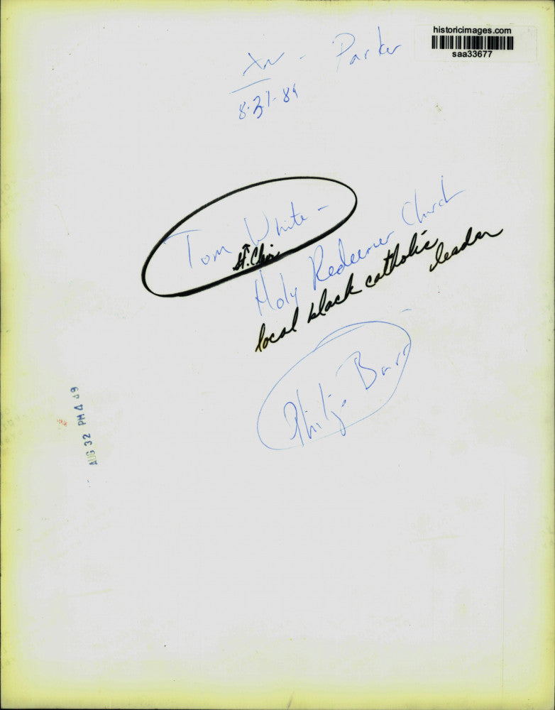 1988 Press Photo Tom St. Clair White stands outside Holy Redeemer Church, Texas