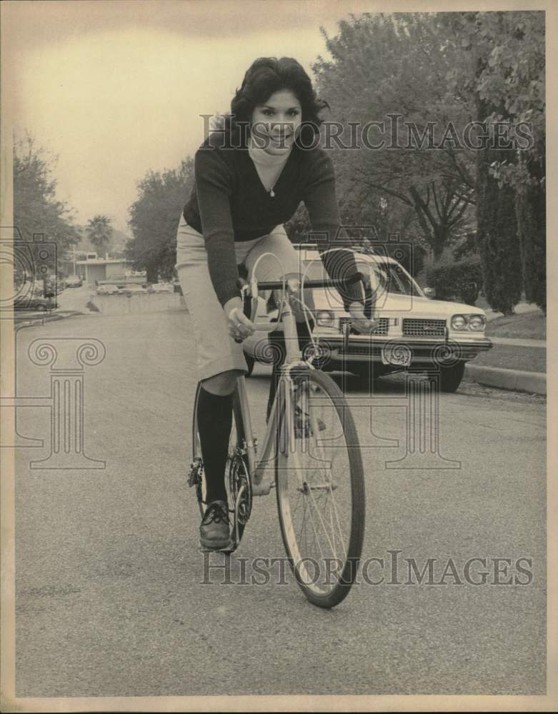 Press Photo Miss Fiesta Sandra Ojeda riding her bike, Texas - saa50668- Historic Images