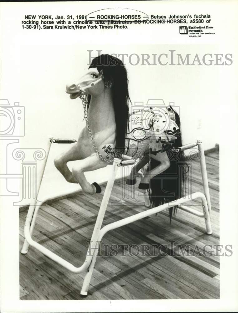 1991 Press Photo Betsey Johnson's fuchsia rocking horse with tutu, New York- Historic Images