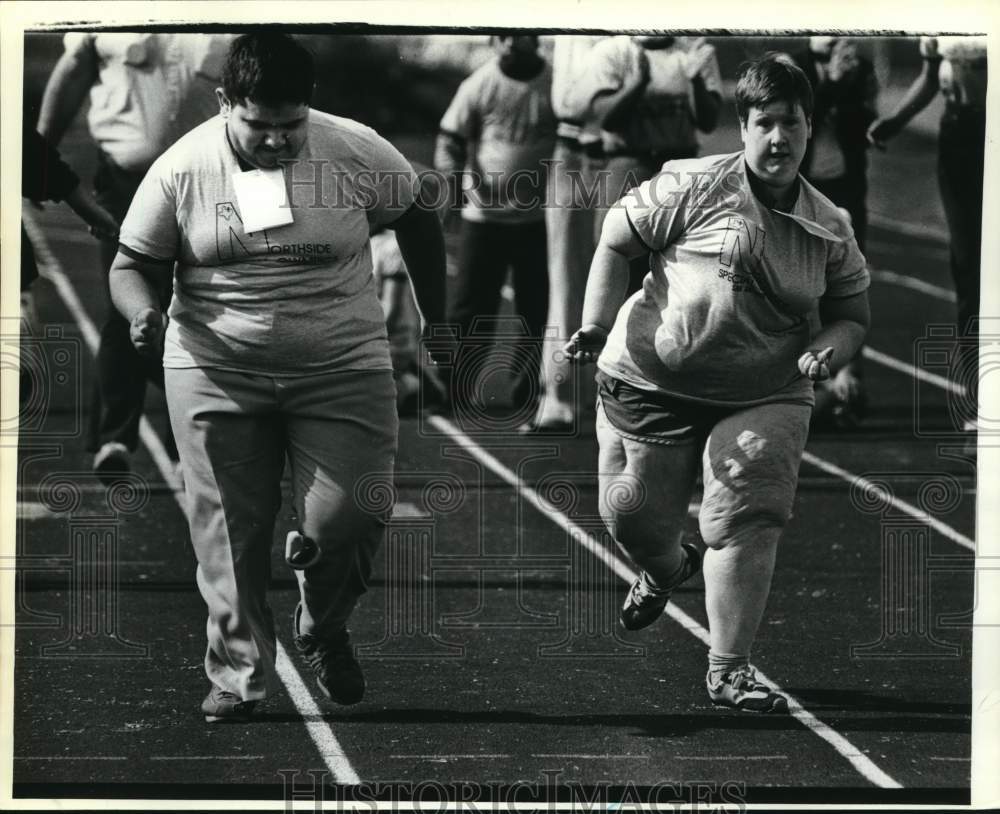 1982 Press Photo Special Olympics participants running track event, Texas- Historic Images