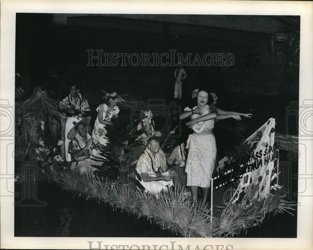 1949 Press Photo Island dancers riding on float - saa73553- Historic Images