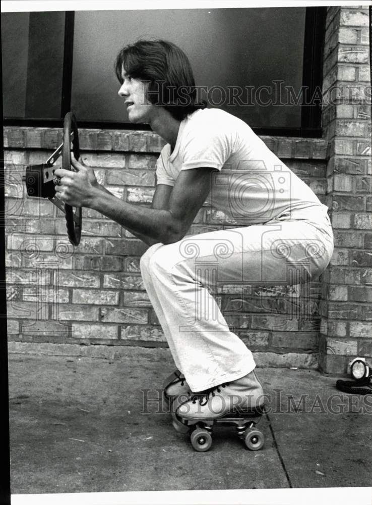 Press Photo Colin Dangaard on Roller Skates with Steering Wheel - saa94731- Historic Images