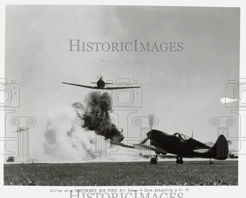 Press Photo Zero attacking a P-40 aircraft at Confederate Air Force show- Historic Images
