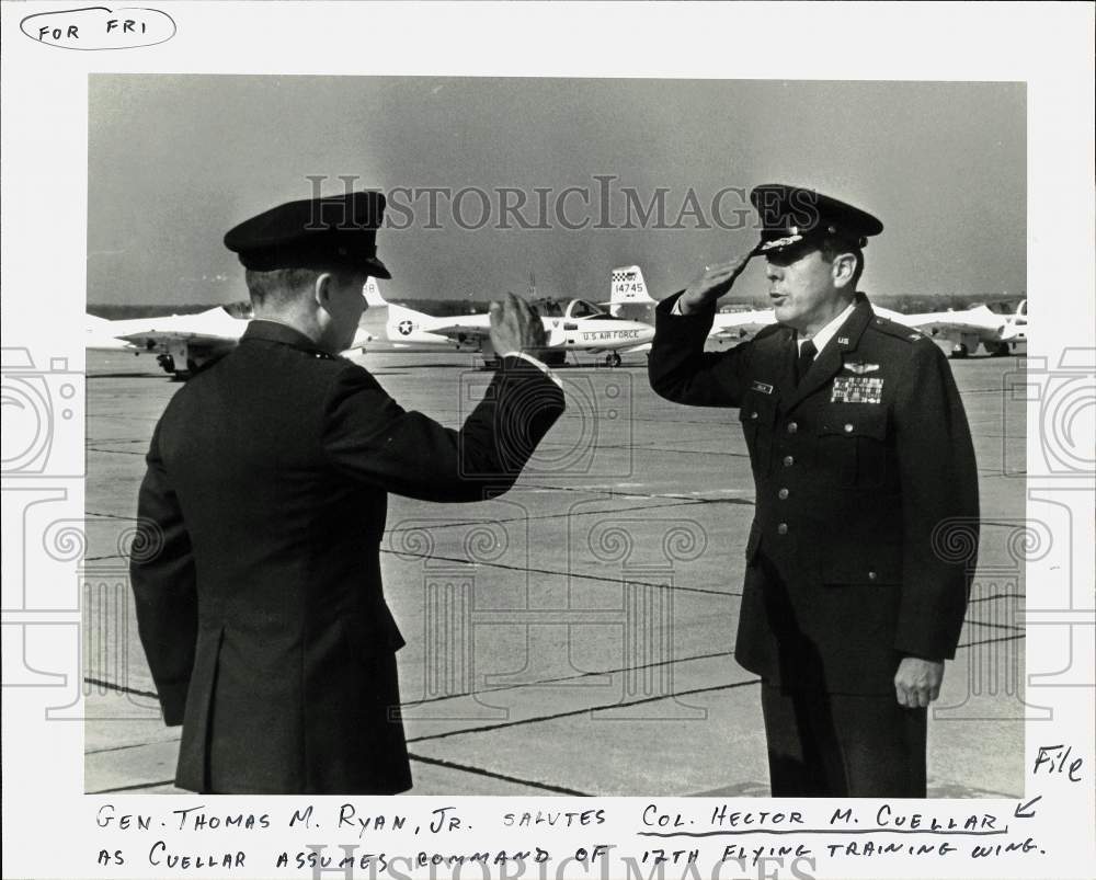 Press Photo General Thomas M. Ryan Jr. salutes Colonel Hector M. Cuellar, Texas