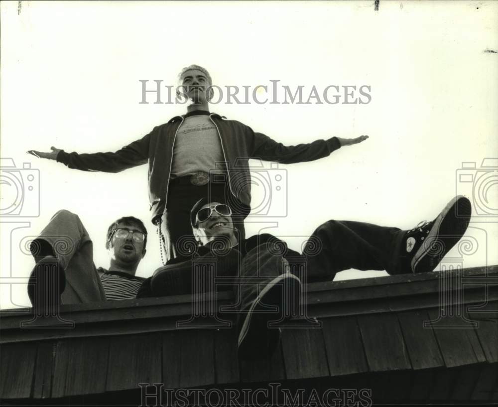 1996 Press Photo Three Members of Chapstik, Rock Band on top of roof - sap02410- Historic Images