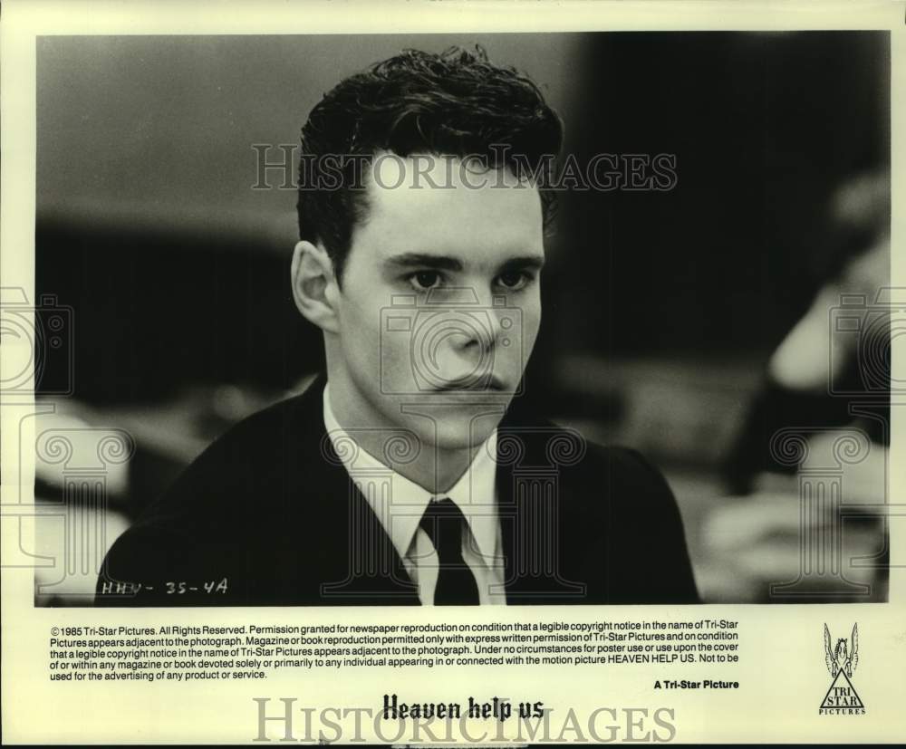 1985 Press Photo Actor Kevin Dillon at Rooney in Heaven Help Us movie scene- Historic Images