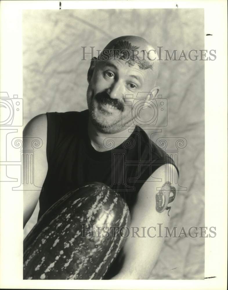 1996 Press Photo Entertainer Gallagher with shaved head and holding watermelon- Historic Images