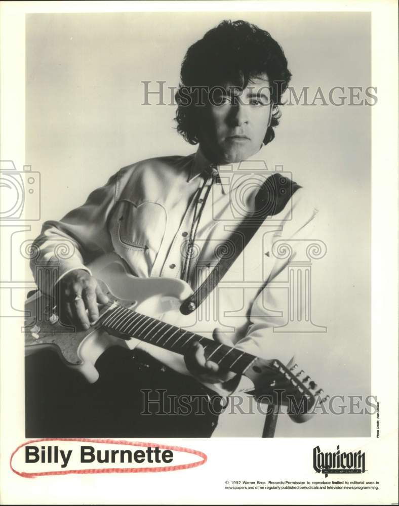 1992 Press Photo Musician Billy Burnette in portrait holding guitar - sap07859- Historic Images