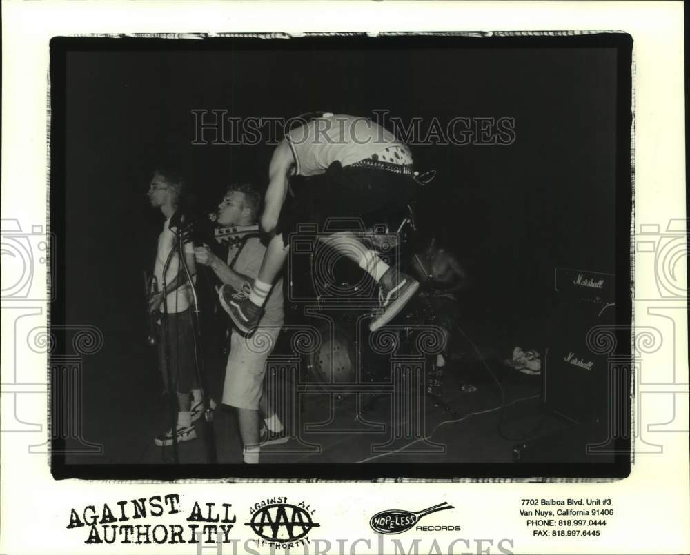 2000 Press Photo Members of the band Against All Authority during performance- Historic Images