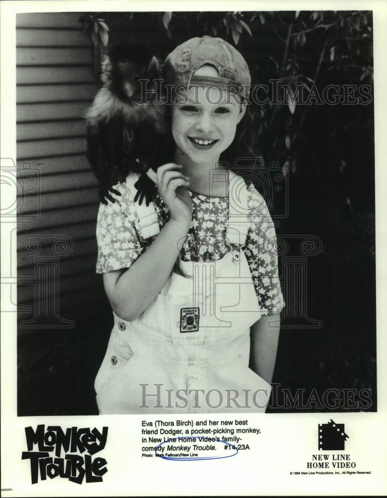 1994 Press Photo Actress Thora Birch with Dodger, monkey in "Monkey Trouble"- Historic Images