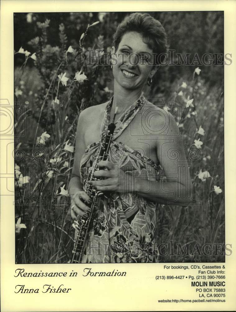 2000 Press Photo Anna Fisher, musician, poses with her Oboe - sap10650- Historic Images