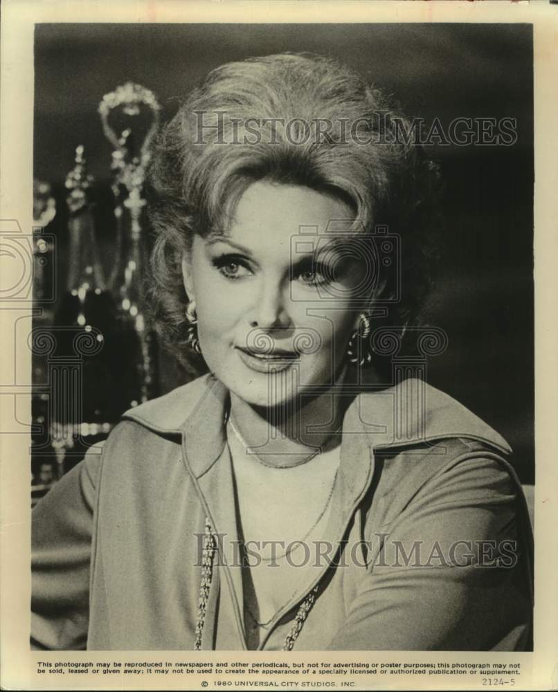 1980 Press Photo Rhonda Fleming stars as fashion designer in "The Nude Bomb"- Historic Images